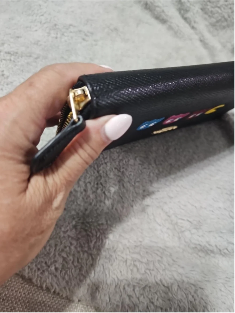 Coach this zip